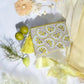 Zesty Charm Clutch - Ocean Ray London