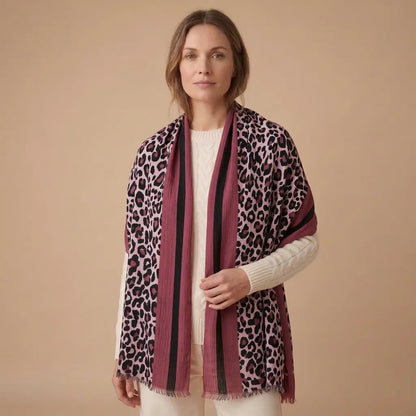Berry Blush Leopard Print Scarf draped on a model in an ivory jumper